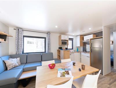Wohnzimmer des Cottage 6 Personen 3 Schlafzimmer 4 Blumen