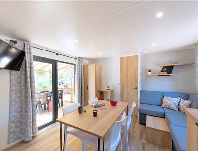 Wohnzimmer des Cottage 6 Personen 3 Schlafzimmer 4 Blumen